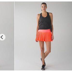 Lululemon Womens Pleated Athletic Skirt Built-In Shorts Bright Coral Orange sz 4